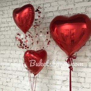 Алые сердца и прозрачные шары с красным конфетти, купить в Букет шаров Измайлово.