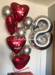 Серебряная цифра восемь и красные шары сердца с гелием на 8 марта, купить в Букет шаров Измайлово.