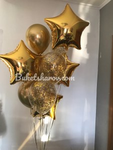 Связка золотых блестящих шаров со звёздами и конфетти — купить в Букет Шаров Измайлово с быстрой доставкой и выгодной скидкой.